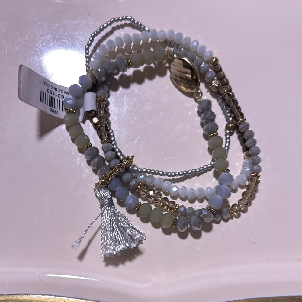 ANTHROPOLOGIE… Gray Beaded Multi-Strand Stretchy Bracelet W/ Tassel NWT